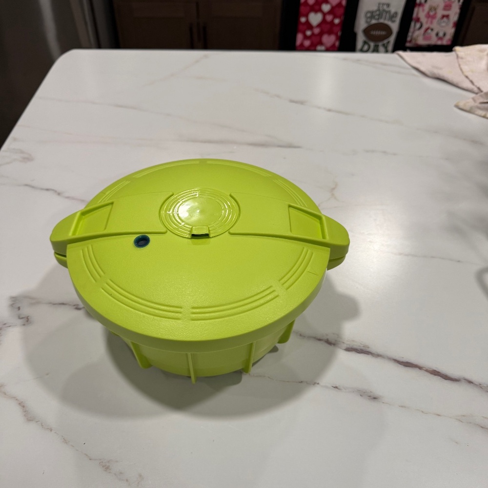 Prestige MicroChef 4-Liter Microwave Pressure Cooker in green.